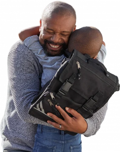 Our People a man and child hugging